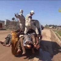 | White Helmets workers posing with the bodies of dead Syrian soldiers | MR Online