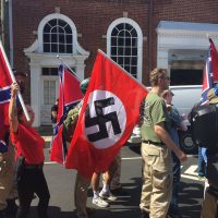 | Right wing protestors flying the Nazi flag along with the the Confederate flag | MR Online