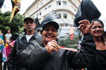 | Members from Colectivos carry Chávez portrait to the Legislative Palace | MR Online