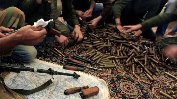| Free Syrian Army militants clean their weapons and check ammunition at their base on the outskirts of Aleppo Syria Khalil HamraAP | MR Online