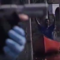 Person pointing a gun at someone drifting in a canoe after a natural disaster