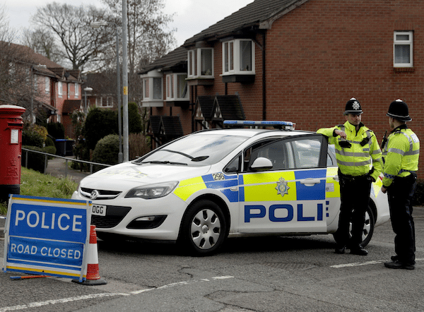 | Police officers stand guard at the bottom of the road where former Russian double agent Sergei Skripal lives in Salisbury England | MR Online
