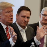 Peter Thiel founder of CIA-funded Palantir, listens as Donald Trump speaks during a meeting with tech leaders at Trump Tower in New York, Dec. 14, 2016. (AP/Evan Vucci)