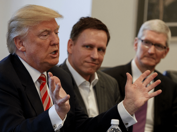 | Peter Thiel founder of CIAfunded Palantir listens as Donald Trump speaks during a meeting with tech leaders at Trump Tower in New York Dec 14 2016 APEvan Vucci | MR Online