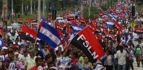 | Sandinistas and followers of President Daniel Ortega wave their Sandinista flags in a march for peace in Managua Nicaragua Saturday | MR Online