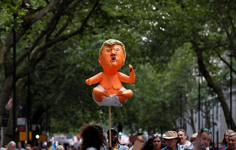 | Demonstrators hold a handmade model depicting a baby Donald Trump as they take part in an antiTrump protest in central London | MR Online