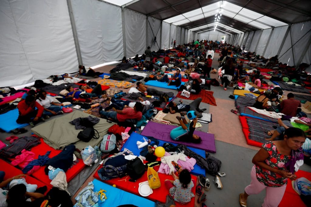 Central American migrants settle at the Jesus Martinez stadium, in Mexico City, Nov. 5, 2018. Marco Ugarte | AP