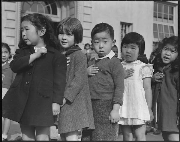 | Header photo School children reciting the Pledge of Allegiance shortly before the military roundup of Japanese Americans on the West Coast April 20 1942 Original caption San Francisco California Many children of Japanese ancestry attended Raphael Weill public School Geary and Buchanan Streets prior to evacuation This scene shows first graders during flag pledge ceremony Evacuees of Japanese ancestry will be housed in War Relocation Authority centers for the duration Provision will be effected for the continuance of education Photo by Dorothea Lange courtesy of the National Archives and Records Administration | MR Online