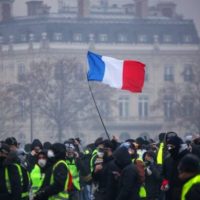 Demonstrators gather near the Arc de Triomphe in Paris during a protest on Saturday.