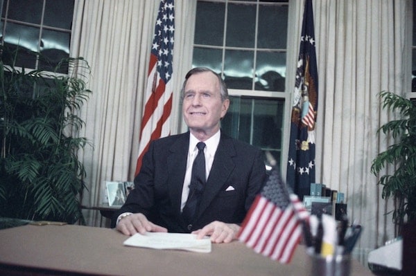 | President George HW Bush addresses the nation from the Oval Office on Jan 16 1991 after US forces began military action against Iraq codenamed Operation Desert Storm Photo Charles TasnadiAP | MR Online