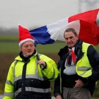 The Globe and Mail Protesters wearing yellow vests, the symbol of a French drivers' protest against higher diesel fuel prices, occupy a roundabout in Somain, France, Dec.