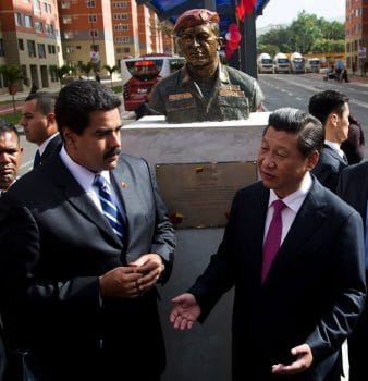 China’s President Xi Jinping, right, and Venezuela’s President Nicolas Maduro speak