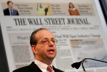 | L Gordon Crovitz thenpublisher of The Wall Street Journal introduces the redesign of the newspaper Dec 4 2006 in New York Mark Lennihan | AP | MR Online