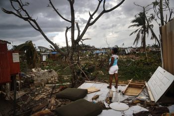 | A woman stands on her property on October 5 2017 about two weeks after Hurricane Maria in San Isidro Puerto Rico Photo Mario TamaGetty Images | MR Online
