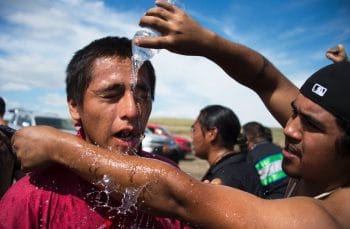 | A protester is treated after being pepper sprayed by private security contractors on land being graded for the Dakota Access pipeline near Cannon Ball ND on Sept 3 2016 | MR Online