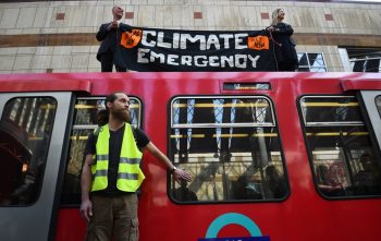 | XR protest on Dockland Light Railway at Canary Wharf station | MR Online