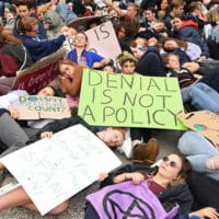 Protestors stage a 'Die In' in at the corner of Bourke and Swanston Streets in Melbourne, Australia on May 24, 2019. Protestors including the 'Extinction Rebellion' took to the CBD in order to show the Earth's sixth mass extinction in reaction to Climate Change. Quinn Rooney—Getty Images