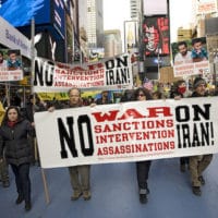 | Feb 4 2012 International Day of Action NO US War on Iran Actrivists rally in Times Square NYC and march to UN and Israeli Embassy to protest war mongering against Iran sanctions and drone strikes | MR Online