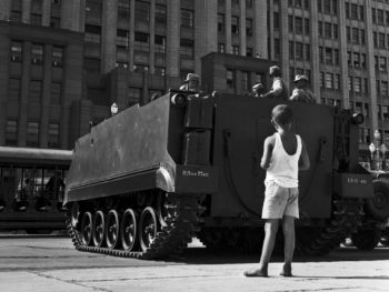 A boy observes soldiers during a rally organized by then-President João Goulart in Rio de Janeiro on March 13, 1964. Current President Jair Bolsonaro, an ex-army captain, campaigned on nostalgia for the scorched-earth policies and torture basements of Brazil’s military dictatorship, which ruled for 21 years. Photo: Domício Pinheiro/Agência Estado via AP