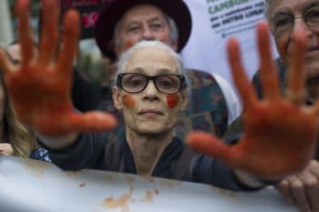| Brazilian actress Sonia Braga shows her hands painted red representing blood during a protest in defense of the Amazon while wildfires burn in that region in Rio de Janeiro Brazil Sunday Aug 25 2019 Experts from the country | MR Online's satellite monitoring agency say most of the fires are set by farmers or ranchers clearing existing farmland, but the same monitoring agency has reported a sharp increase in deforestation this year as well. (AP Photo/Bruna Prado)