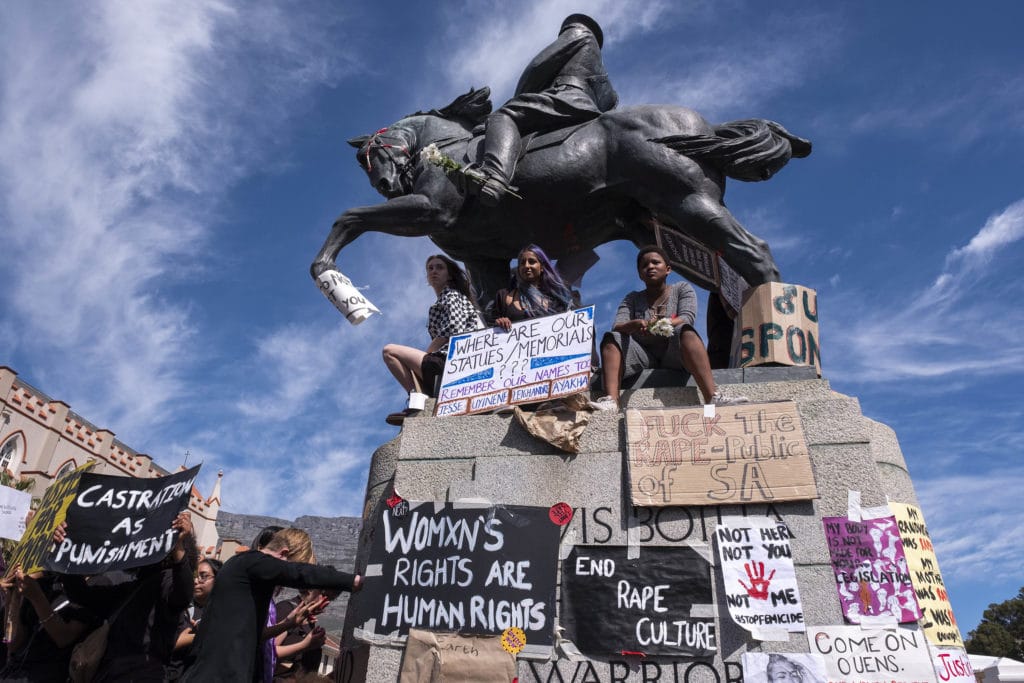 | Protesters used the statue of Louis Botha outside Parliament in Cape Town as a vantage point and a pinboard for posters | MR Online