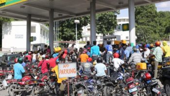 | Motorcycle taxi drivers waiting for a gas delivery Photo by Paul Jean Emile | MR Online