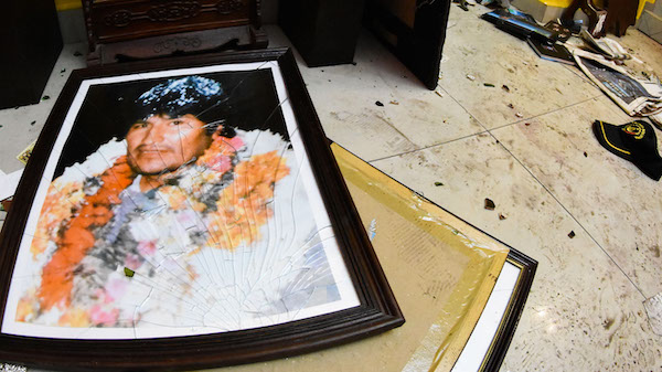 | A broken portrait of former Bolivias President Evo Morales is on the floor of his private home in Cochabamba Bolivia after hooded opponents broke into the residence on Nov 10 2019 Photo | AP | MR Online
