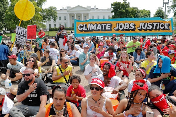 | Demonstrators sit on the ground in front of the White House April 29 2017 during a demonstration and march Thousands gathered across the country to march in protest of President Trumps environmental policies which have included rolling back restrictions on mining oil drilling and greenhouse gas emissions at coalfired power plants| Pablo Martinez Monsivais AP | MR Online
