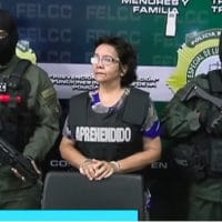 A press conference announcing the arrest of Hospital Administrator, Mirtha Sanjinez, center, in La Paz, Bolivia. Screenshot | YouTube