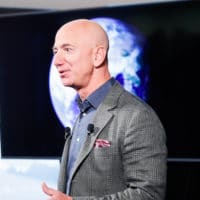 Amazon CEO Jeff Bezos answers questions during his news conference at the National Press Club in Washington, Thursday, Sept. 19, 2019. Bezos announced the Climate Pledge, setting a goal to meet the Paris Agreement 10 years early. (AP Photo/Pablo Martinez Monsivais)