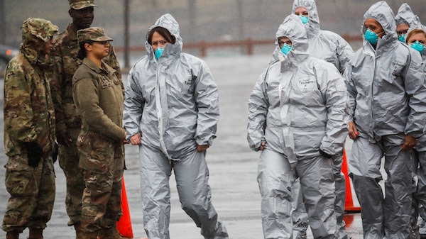 | Medical personnel arrive to perform COVID19 coronavirus infection testing procedures at Glen Island Park Friday March 13 2020 in New Rochelle NY AP PhotoJohn Minchillo | MR Online