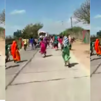 People run behind the flour truck in Rajasthan. Photo- Video screengrab