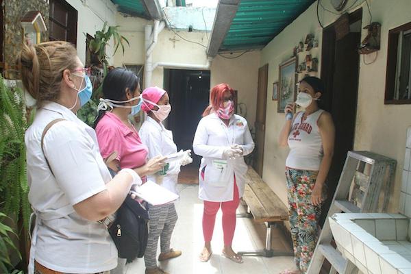 | Venezuelan doctors conducting a COVID19 house visit Photo courtesy of OrlenysOV | MR Online