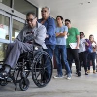 Californians wait in line to vote on Super Tuesday, March 3, 2020. AP Photo/Ringo H.W. Chiu