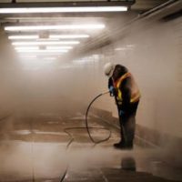 Workers clean a subway station in Brooklyn as New York City confronts the coronavirus outbreak on March 11, 2020 in New York City. , Spencer Platt/Getty Images