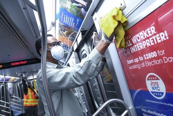 | Personnel disinfect a New York City subway car Image Flickr New York MTA | MR Online