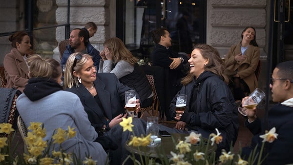 | People chat and drink in Stockholm Sweden Wednesday April 8 2020 © AP Photo Andres Kudacki | MR Online