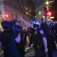 A police officer shouts at Associated Press videojournalist on June 2, 2020, in New York. Photo: Wong Maye-E/AP