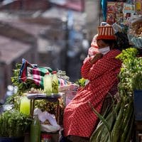 Herb and spice vendor working (despite the pandemic). Santa Cruz Street, La Paz, Bolivia, 2020. Carlos Fiengo