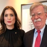 Vanessa Neumann is pictured with disgraced Trump advisor John Bolton in Aug, 2019. (@vanessaneumann)