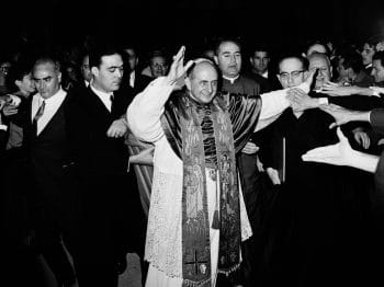 Pope Paul VI is surrounded by Opus Dei personnel near Italys International Center for Working Youth Nov 21 1965 Gianni Foggia | AP