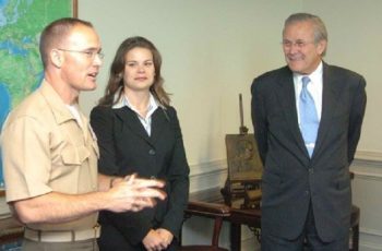 Future CLS Strategies senior advisor David Romley in his Marines uniform with Secretary of Defense Donald Rumsfeld