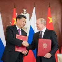 Russian President Vladimir Putin (R) and Chinese President Xi Jinping (R) signed the statements on the “comprehensive strategic partnership of coordination for a new era” and on “strengthening contemporary global strategic stability”, Moscow, June 5, 2019