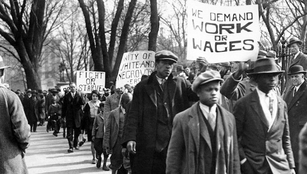 | Work or Wages sign during demonstration | MR Online