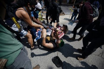 | Anti racist and anti fascist protesters fight over a Confederate flag with members of far right militias in a white pride organization rally near Stone Mountain Park in Stone Mountain Ga on Aug 15 2020 Photo Logan CyrusAFPGetty Images | MR Online