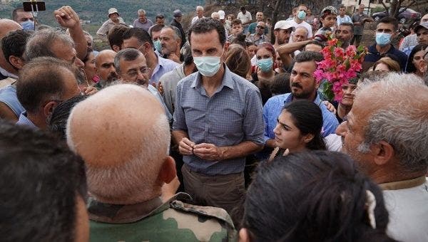 | A handout photo made available by the Syrian Arab News Agency SANA on 14 October 2020 shows Syrian President Bashar alAssad surrounded by locals of Mashta alHelou village in central Syria | Photo EFEEPASANA | MR Online