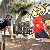| Hong Kong protester throws egg at President Xi Jinpings portrait on Chinas National Day Oct 1 2019 Studio Incendo CC BY 20 Wikimedia Commons | MR Online