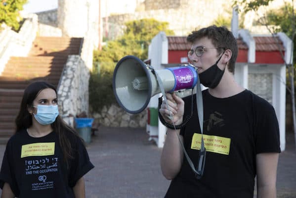 | Conscientious objectors Shahar Peretz left and Daniel Peldi at an anti annexation protest in the city of Rosh Haayin June 2020 Oren Ziv | MR Online