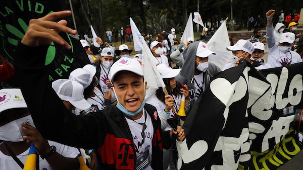 | Excombatants of the disbanded FARC and social activists march to demand the government guarantee their right to life and compliance with the 2016 peace agreement in Bogota Colombia Nov 1 2020 Fernando Vergara | AP | MR Online