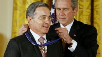 | President George W Bush presents the Presidential Medal of Freedom to Colombian President Alvaro Uribe Tuesday Jan 13 2009 during a ceremony in the East Room of the White House in Washington AP PhotoGerald Herbert | MR Online